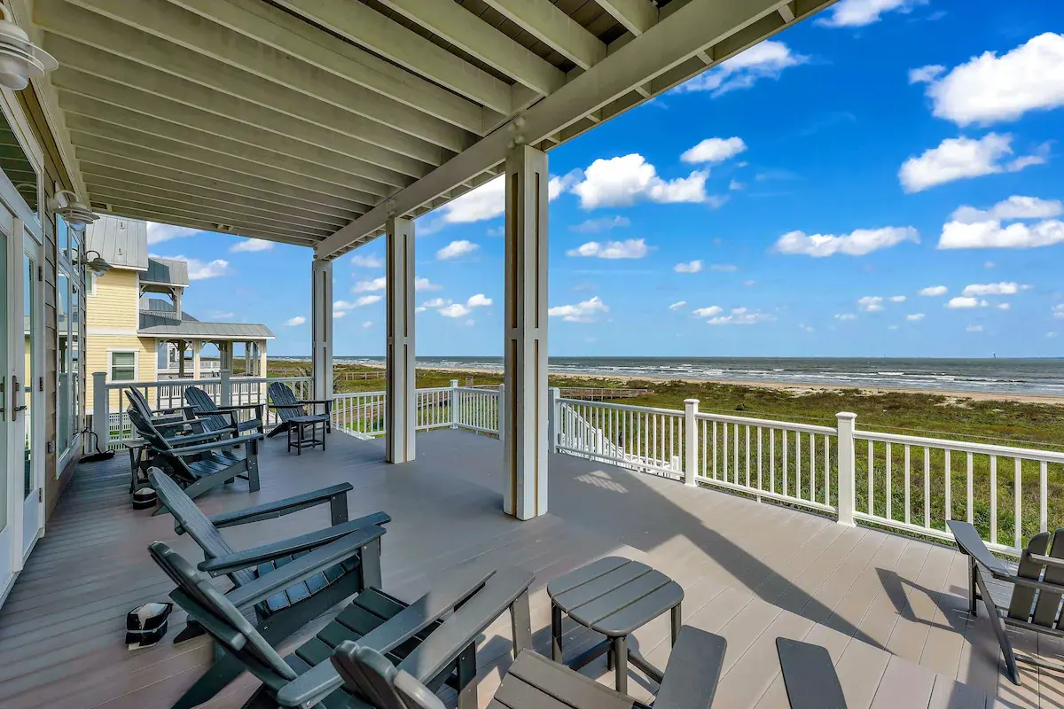 Beachfront deck at Sandy Sea-cret overlooking the dunes and surf